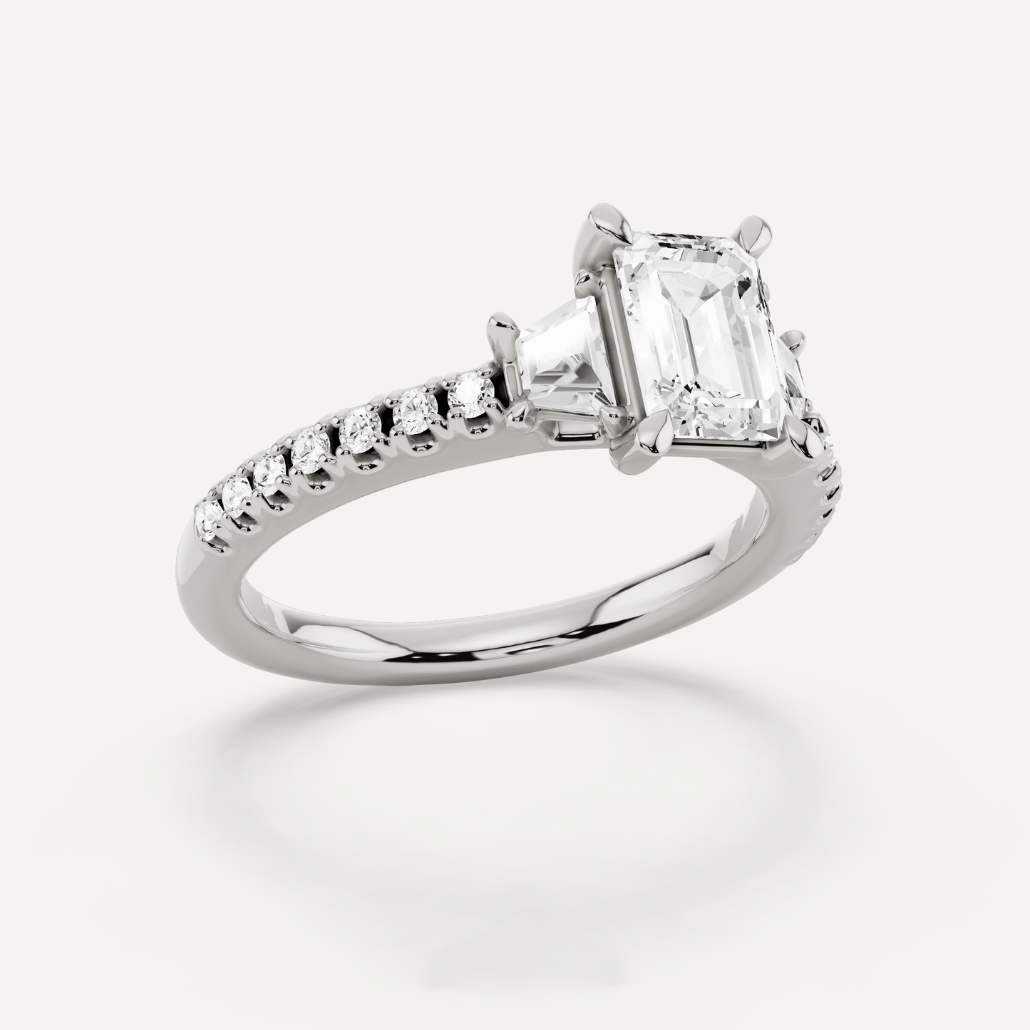 1 1/10 ctw Emerald Diamond Three Stone Engagement Ring With Trapezoid Side Stones - Lotus Diamond