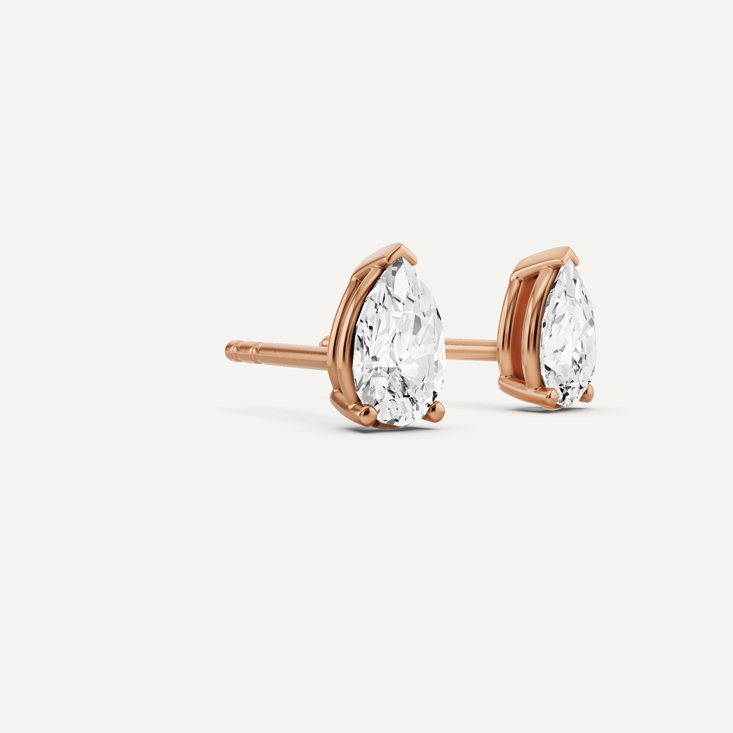 1/2 ctw Pear Diamond Solitaire Stud Earrings - Lotus Diamond