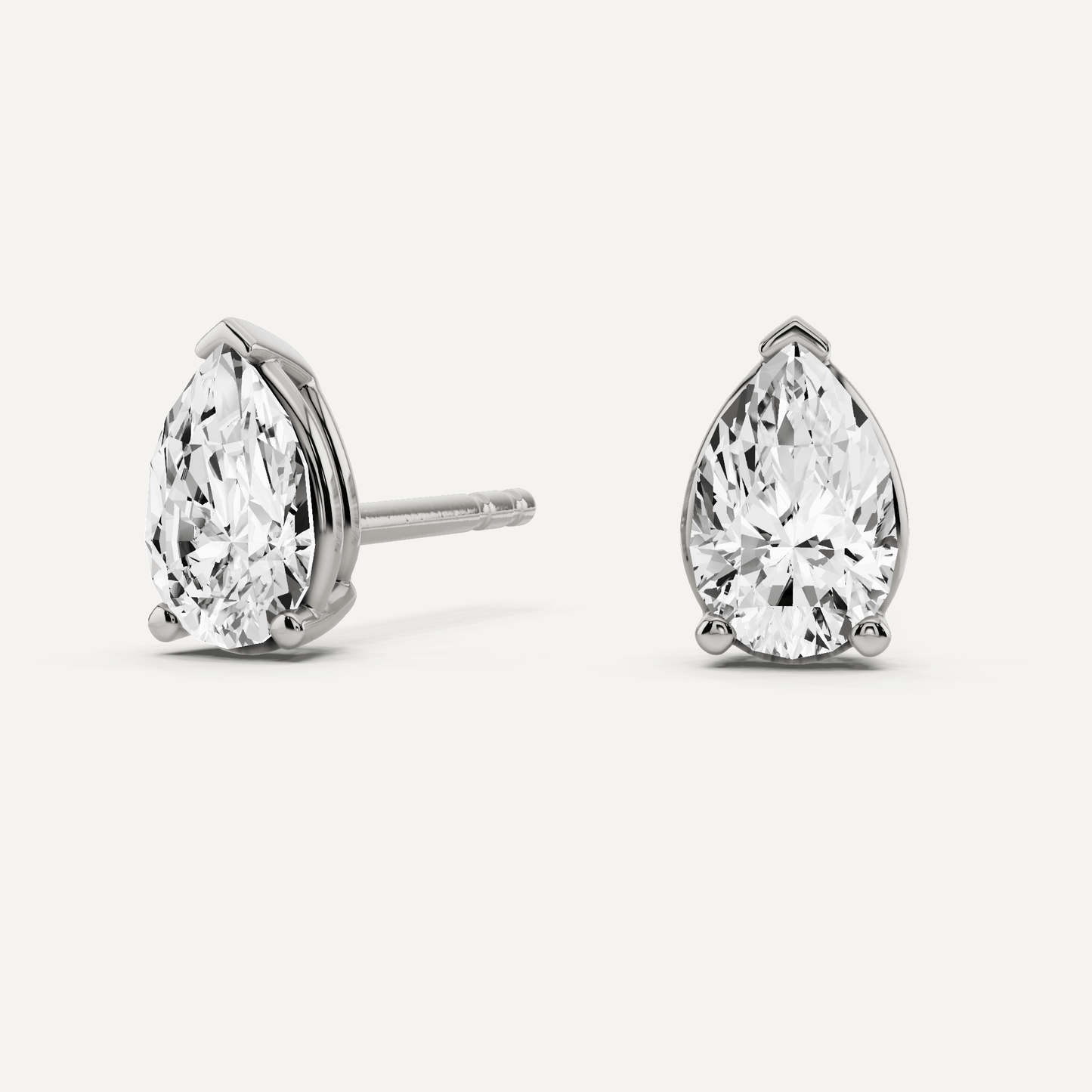 1/2 ctw Pear Diamond Solitaire Stud Earrings - Lotus Diamond