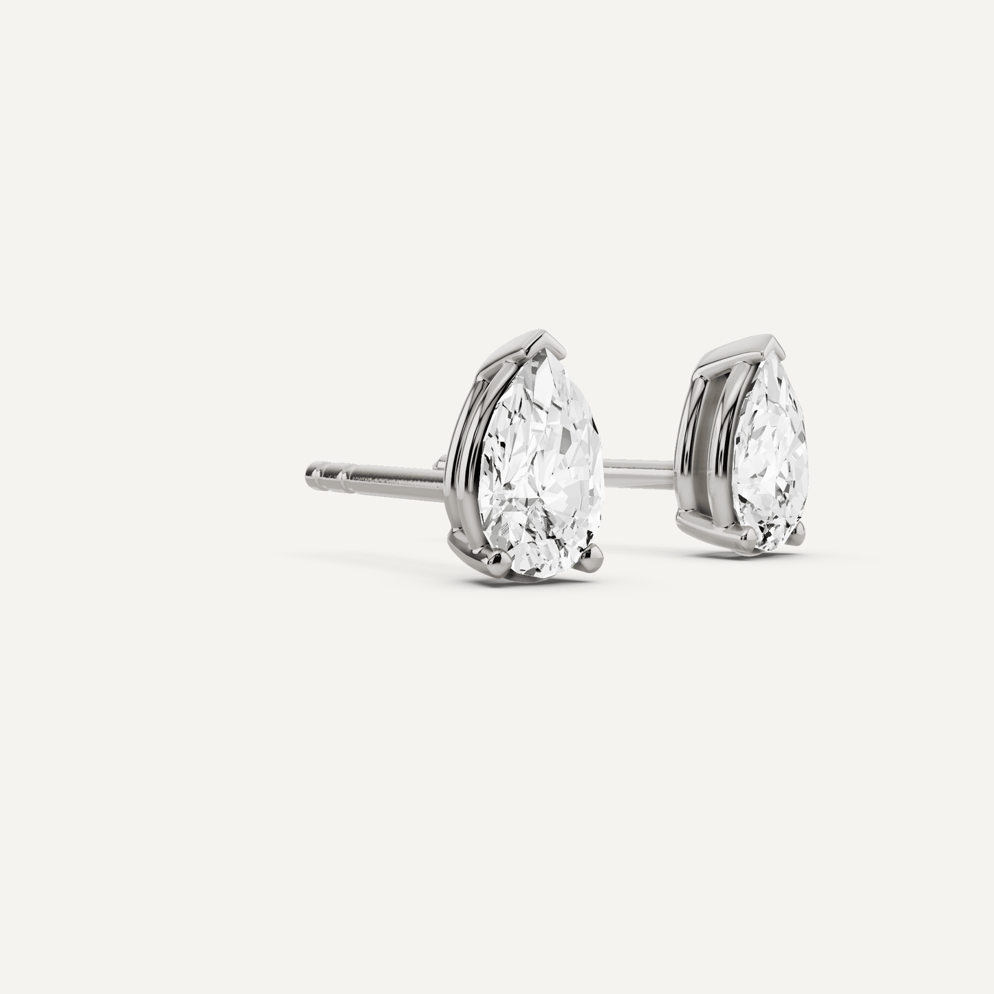 1/2 ctw Pear Diamond Solitaire Stud Earrings - Lotus Diamond