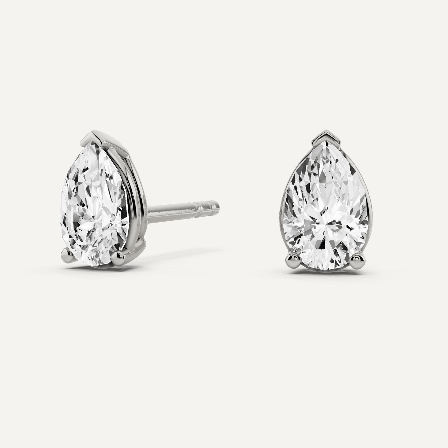1/2 ctw Pear Diamond Solitaire Stud Earrings - Lotus Diamond
