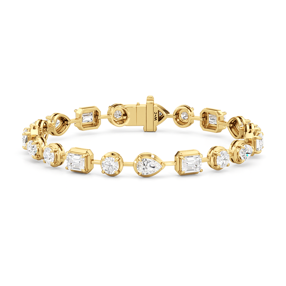 Linear Round, Oval and Emerald Bezel Set Tennis Bracelet - Lotus Diamond