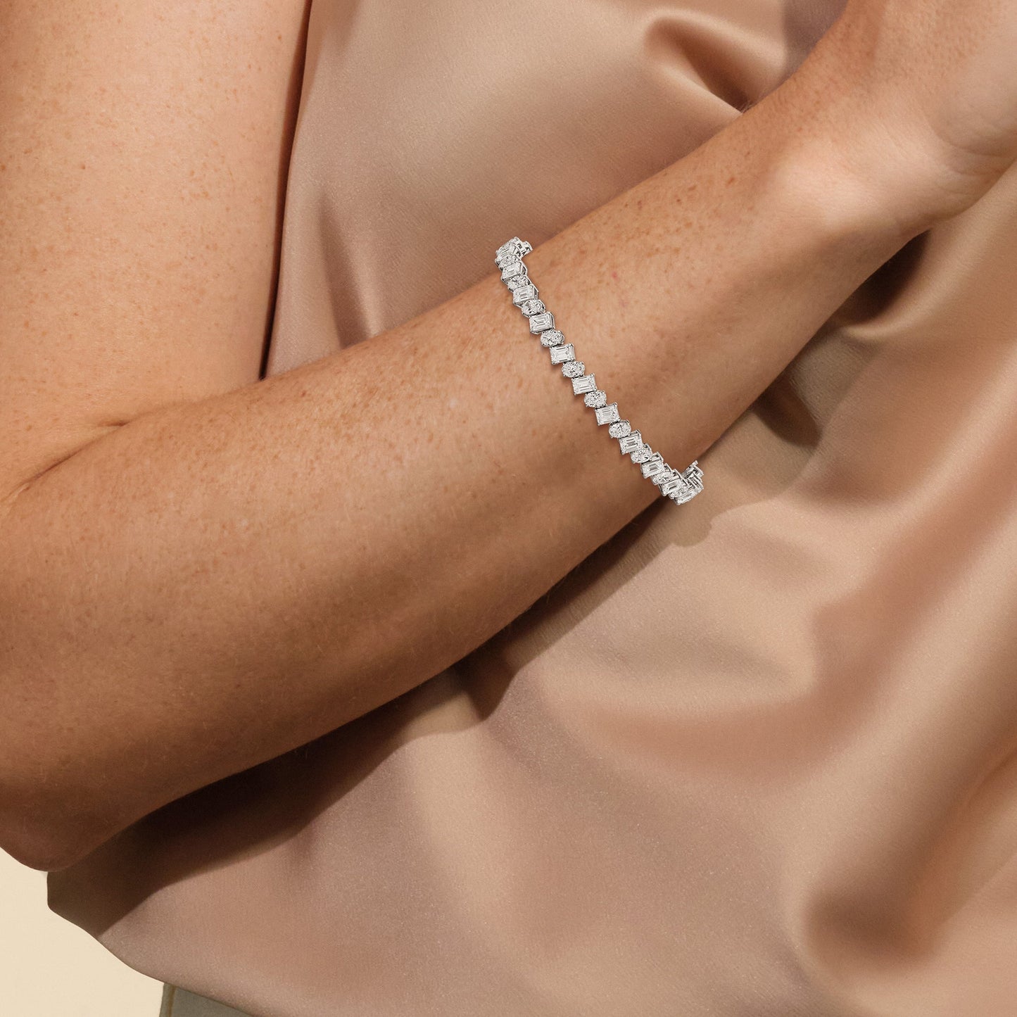 Oval and Emerald Herringbone Tennis Bracelet - Lotus Diamond