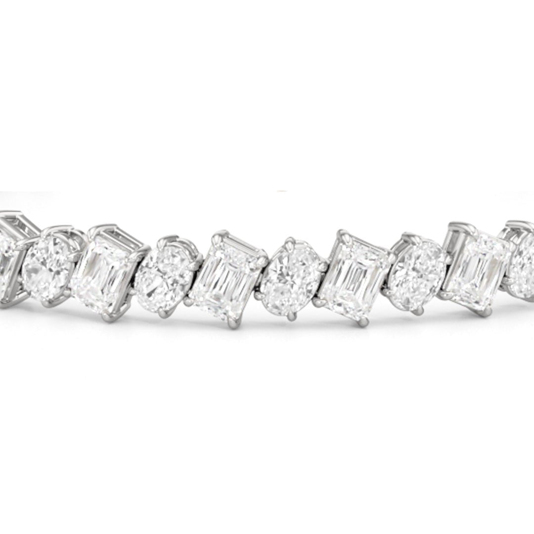 Oval and Emerald Herringbone Tennis Bracelet - Lotus Diamond