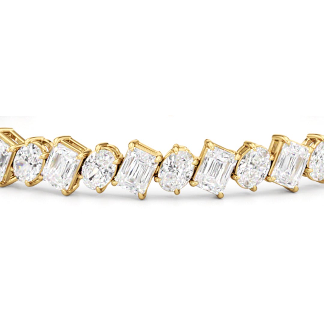 Oval and Emerald Herringbone Tennis Bracelet - Lotus Diamond