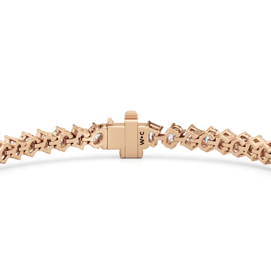 Oval and Emerald Herringbone Tennis Bracelet - Lotus Diamond