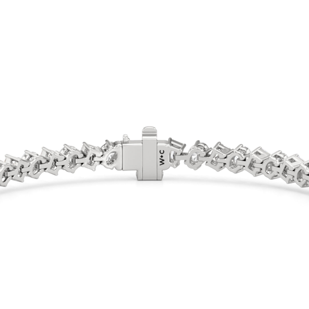 Oval and Emerald Herringbone Tennis Bracelet - Lotus Diamond