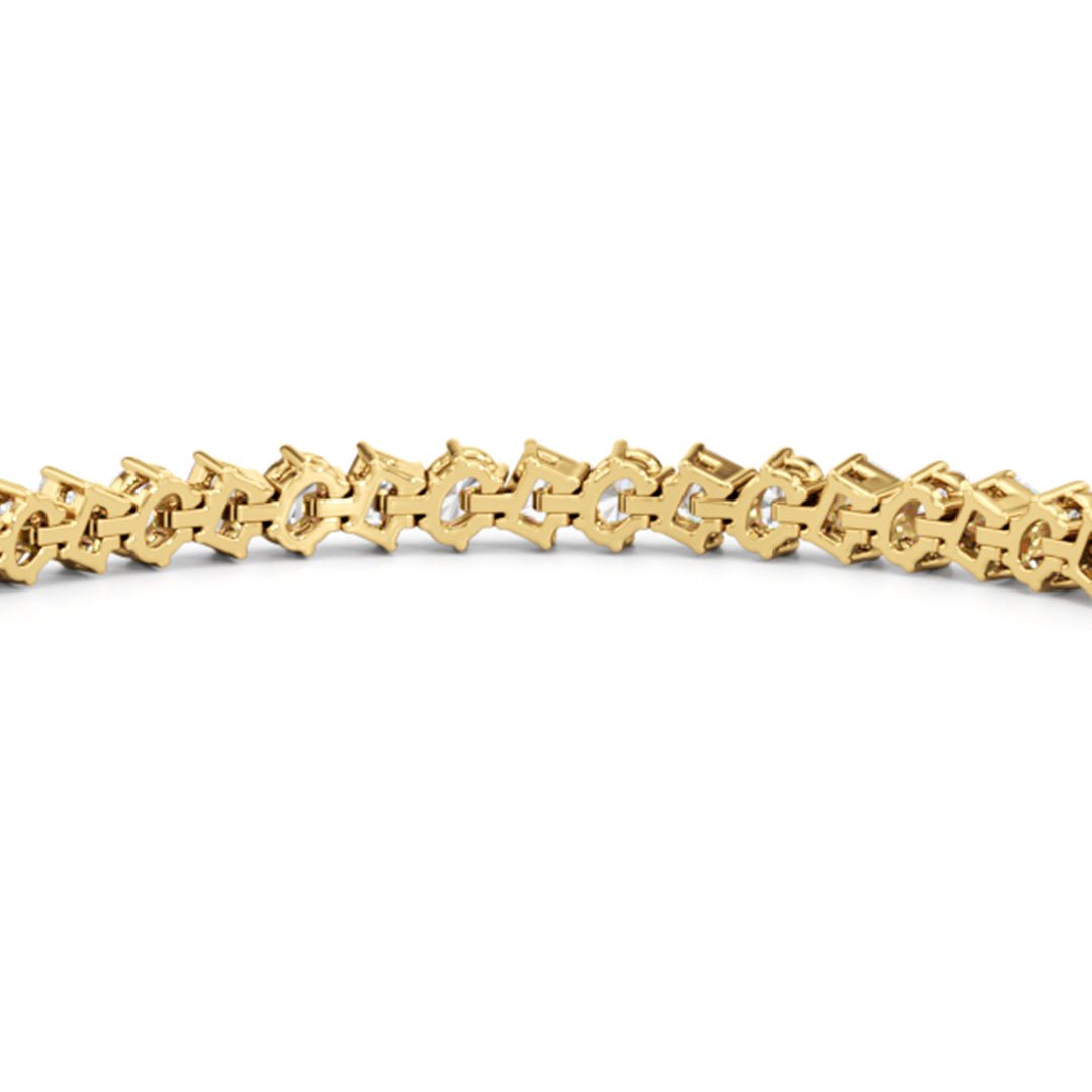 Oval and Emerald Herringbone Tennis Bracelet - Lotus Diamond