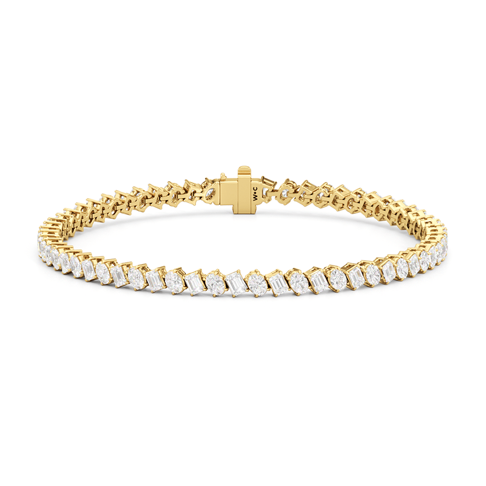 Oval and Emerald Herringbone Tennis Bracelet - Lotus Diamond