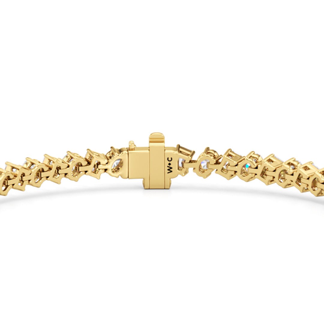 Oval and Emerald Herringbone Tennis Bracelet - Lotus Diamond