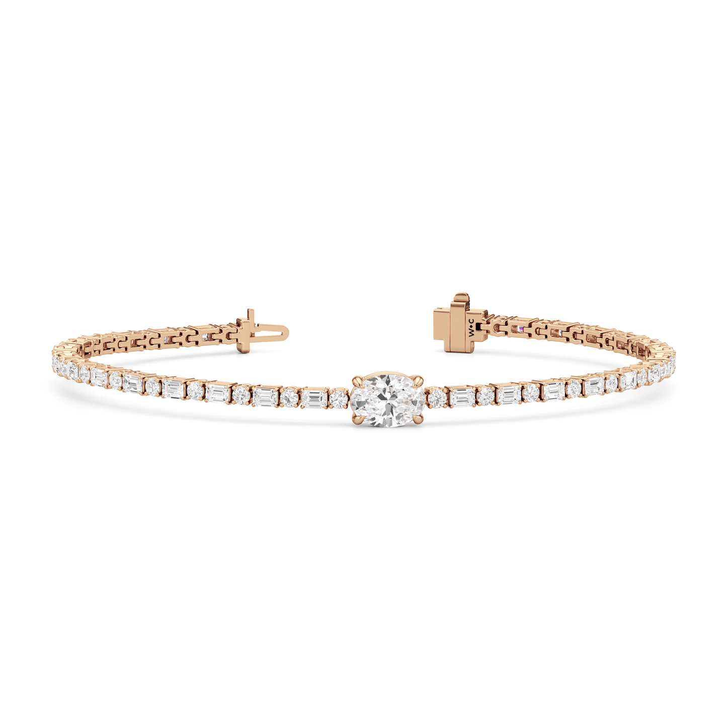 Oval with Trailing Round and Emeralds Tennis Bracelet - Lotus Diamond