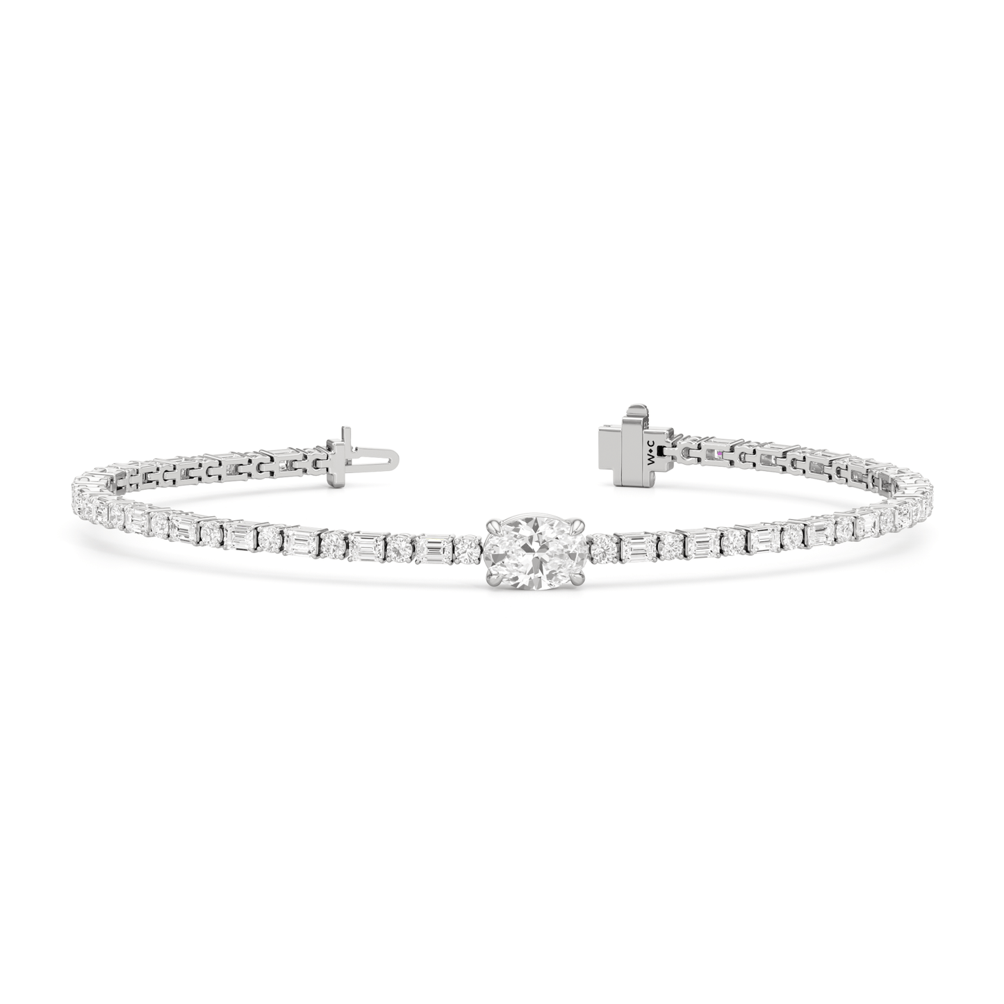 Oval with Trailing Round and Emeralds Tennis Bracelet - Lotus Diamond