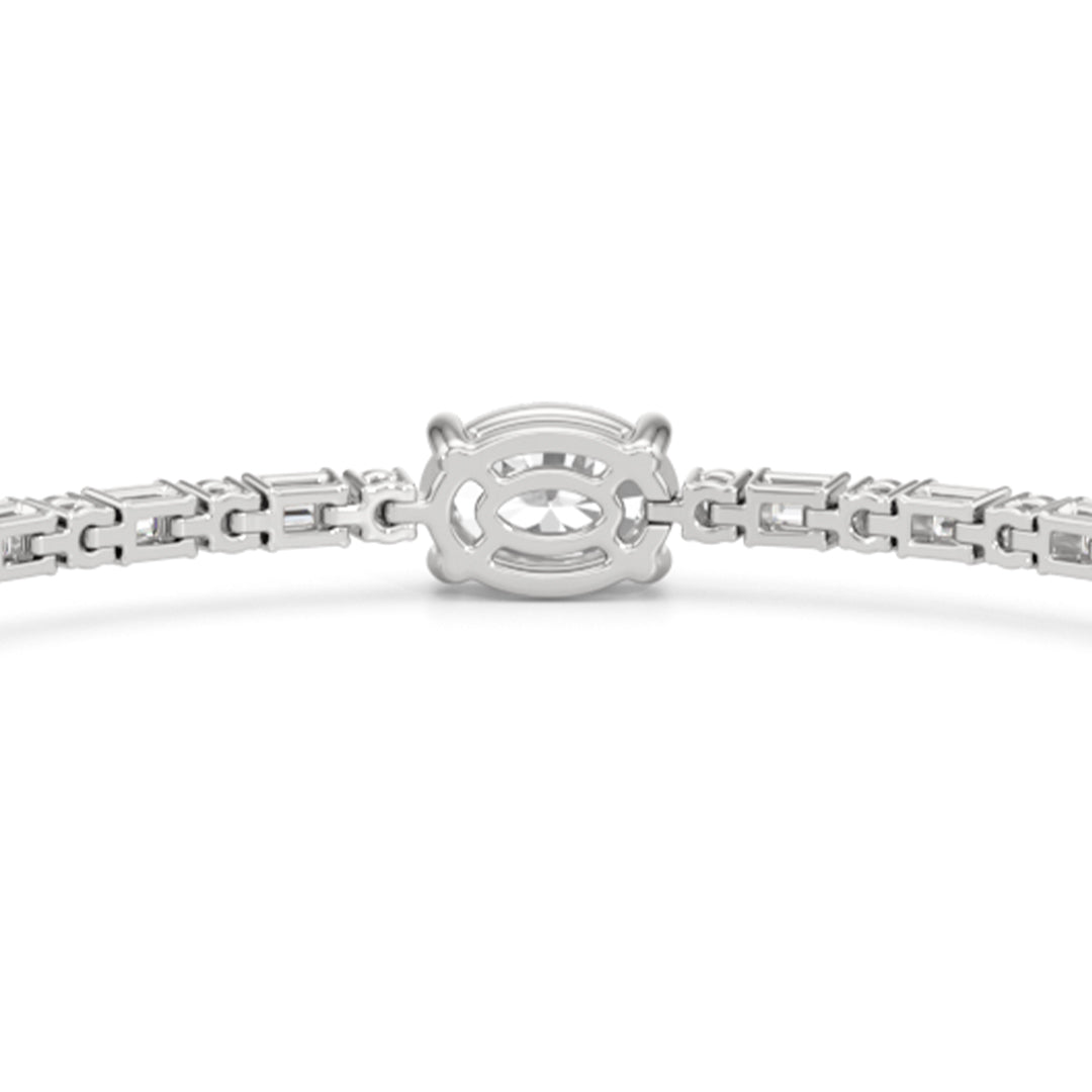 Oval with Trailing Round and Emeralds Tennis Bracelet - Lotus Diamond