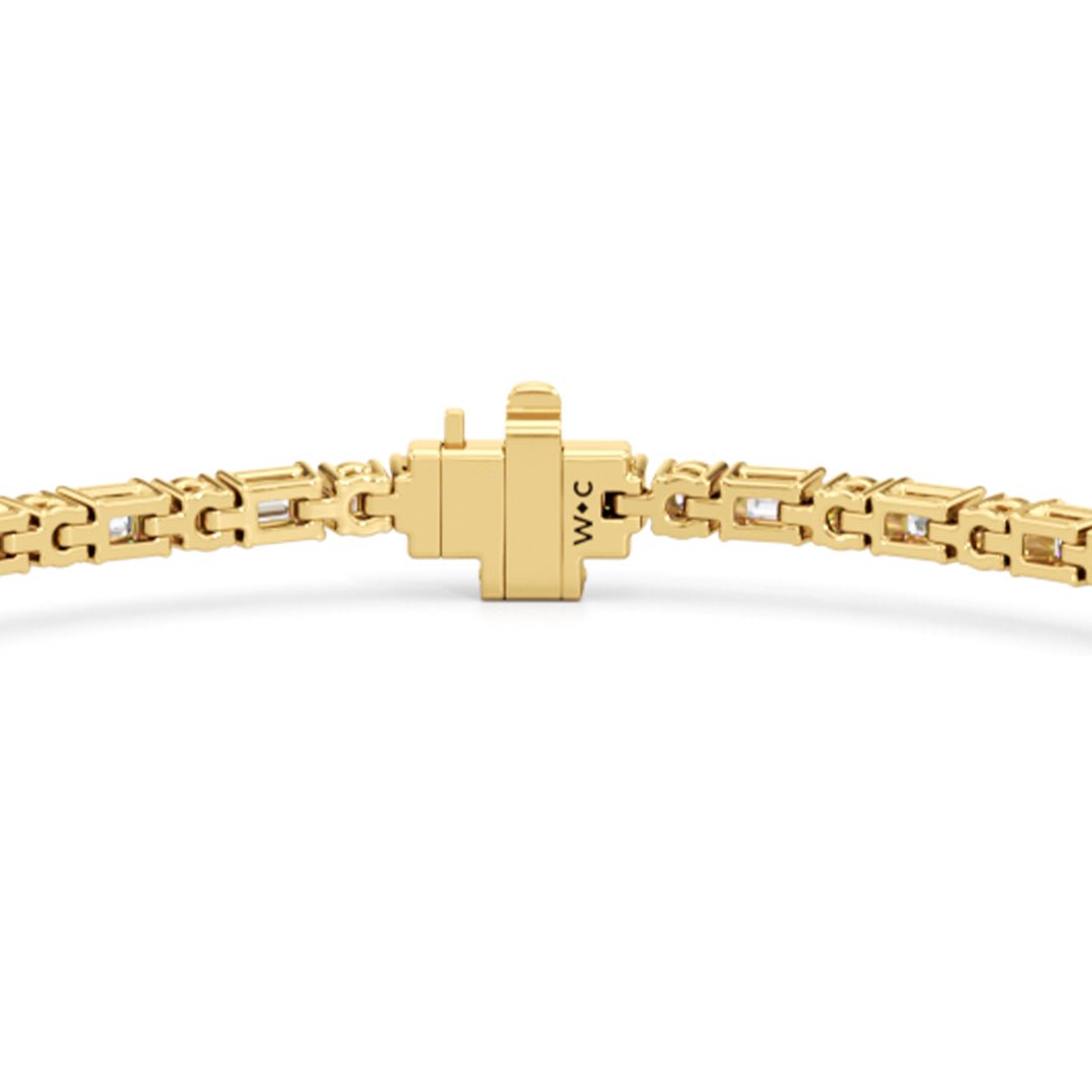 Oval with Trailing Round and Emeralds Tennis Bracelet - Lotus Diamond