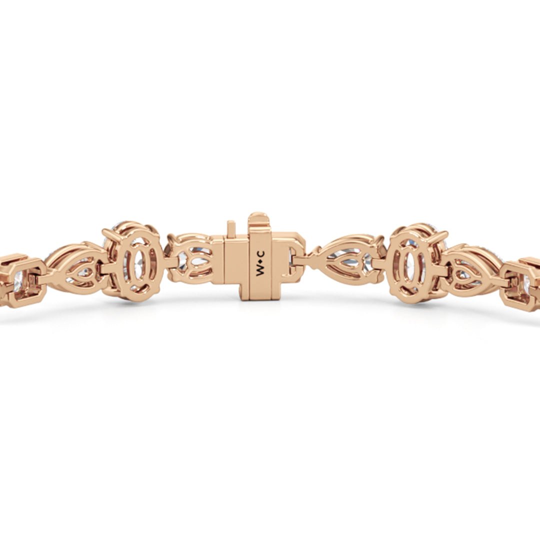 Pear Oval Sequenced with Bezeled Emerald Tennis Bracelet - Lotus Diamond