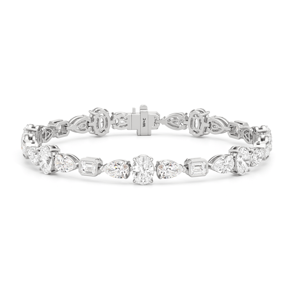 Pear Oval Sequenced with Bezeled Emerald Tennis Bracelet - Lotus Diamond