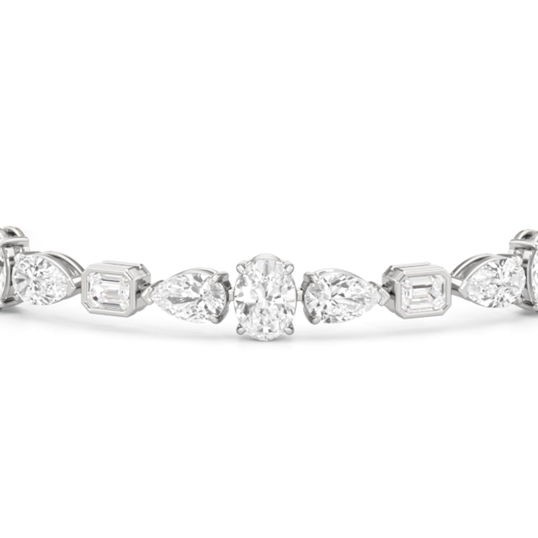 Pear Oval Sequenced with Bezeled Emerald Tennis Bracelet - Lotus Diamond