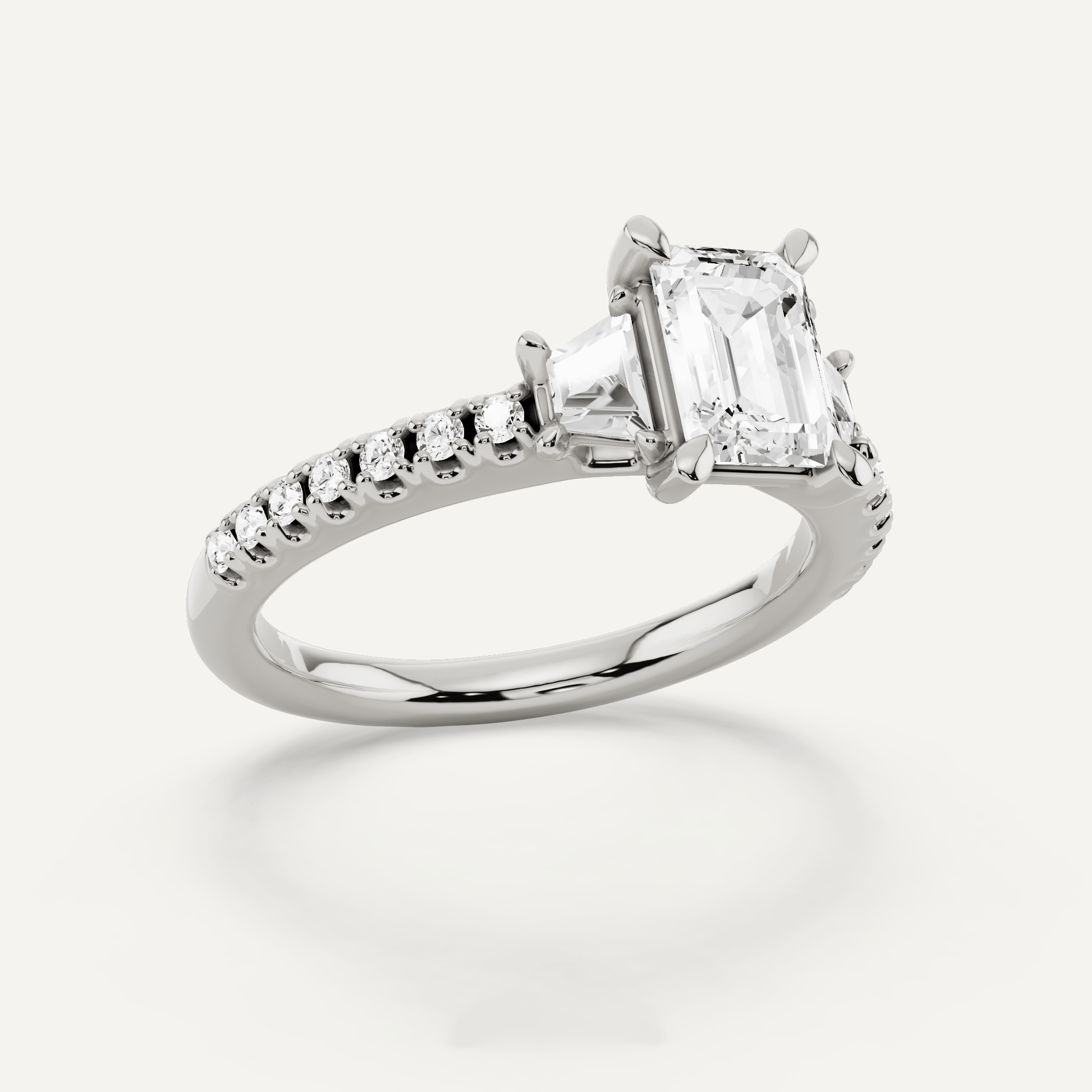 1 1/10 ctw Emerald Diamond Three Stone Engagement Ring With Trapezoid Side Stones - Lotus Diamond