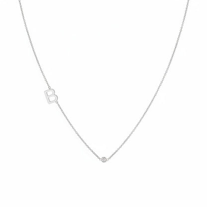Lotus Diamond 14k yellow gold necklace with a single letter B initial and a bezel-set diamond.