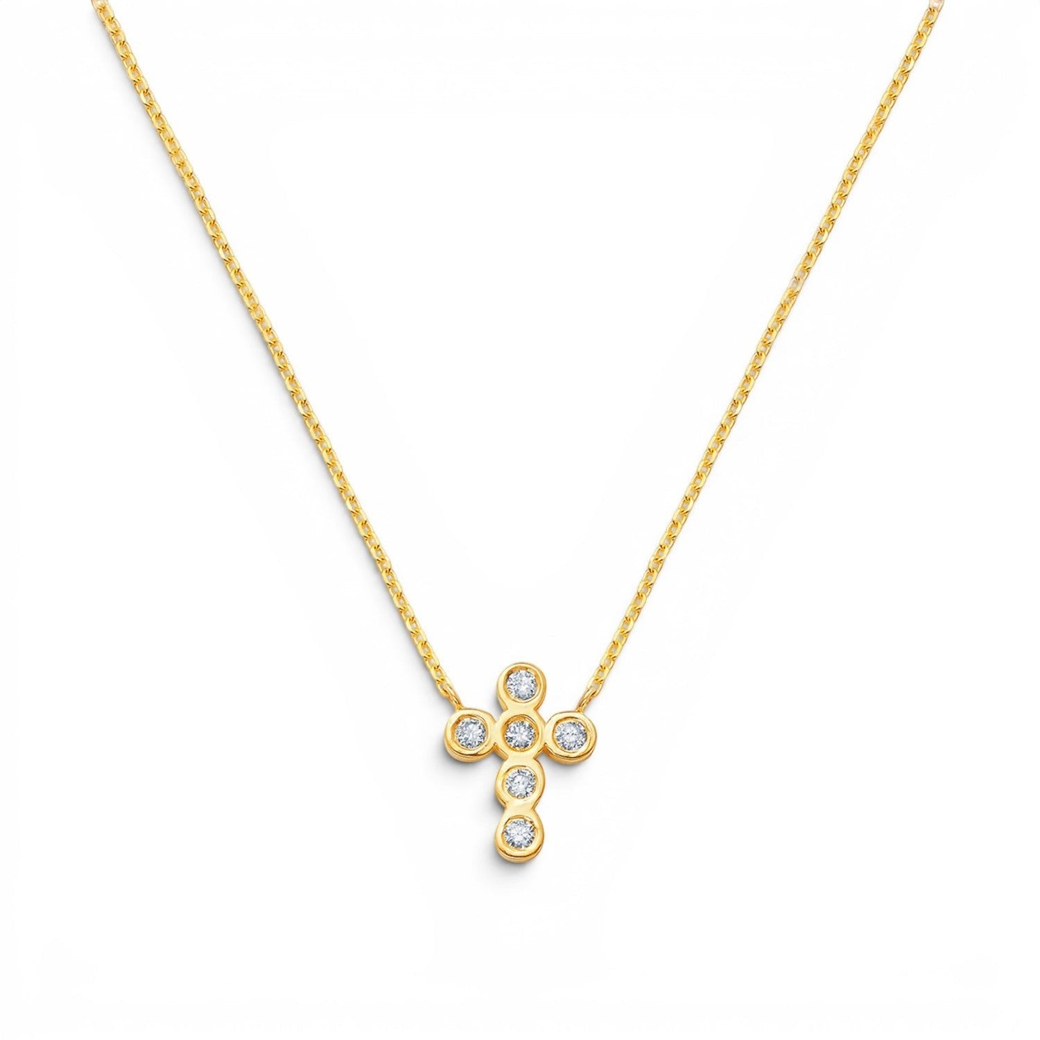 Lotus Diamond Kids 14K gold cross necklace with bezel-set diamonds. Delicate chain.