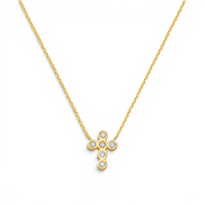 Lotus Diamond Kids 14K gold cross necklace with bezel-set diamonds. Delicate chain.