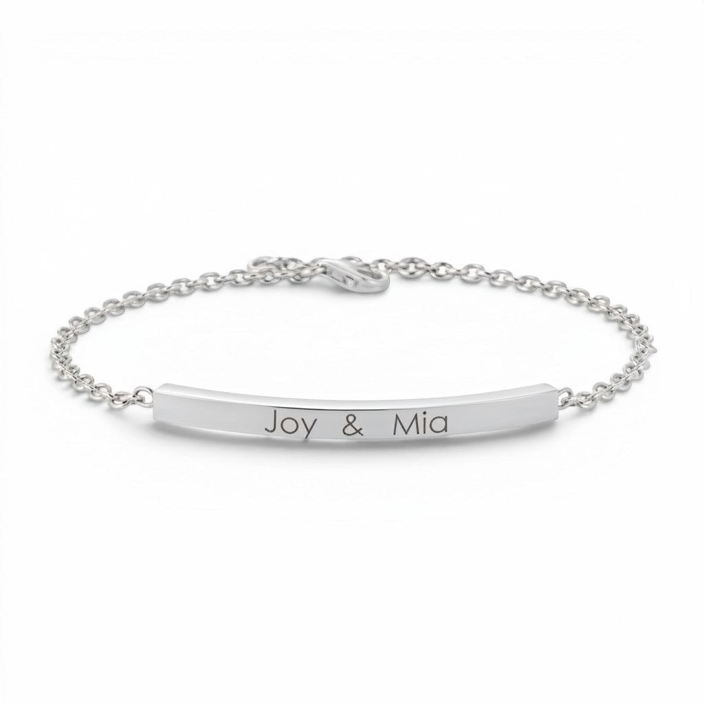 Lotus Diamond Kids Quad Bar ID Engravable Bracelet in recycled gold with 'Joy & Mia' engraving.