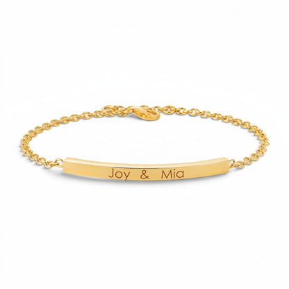 Lotus Diamond Kids Quad Bar ID Engravable Bracelet in recycled gold with 'Olivia & Sienna' engraved.