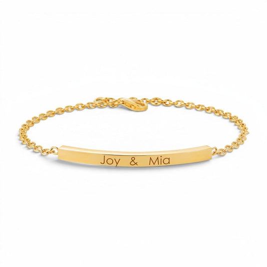 Lotus Diamond Kids Quad Bar ID Engravable Bracelet in recycled gold with 'Olivia & Sienna' engraved.