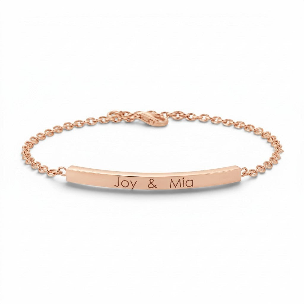 Lotus Diamond Kids Quad Bar ID Engravable Bracelet in recycled gold with "Joy & Mia" engraving.