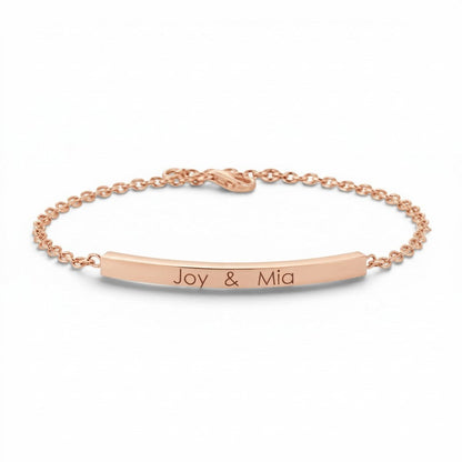 Lotus Diamond Kids Quad Bar ID Engravable Bracelet in recycled gold with "Joy & Mia" engraving.