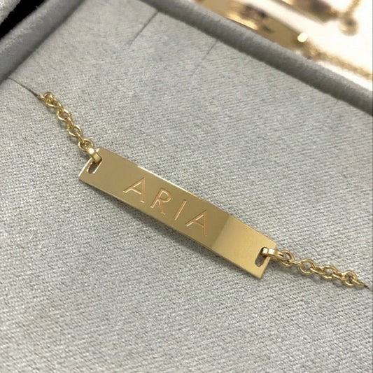 Lotus Diamond Kids Signature Classic Engravable ID Bracelet in 14K gold with 'BENJAMIN' engraved.