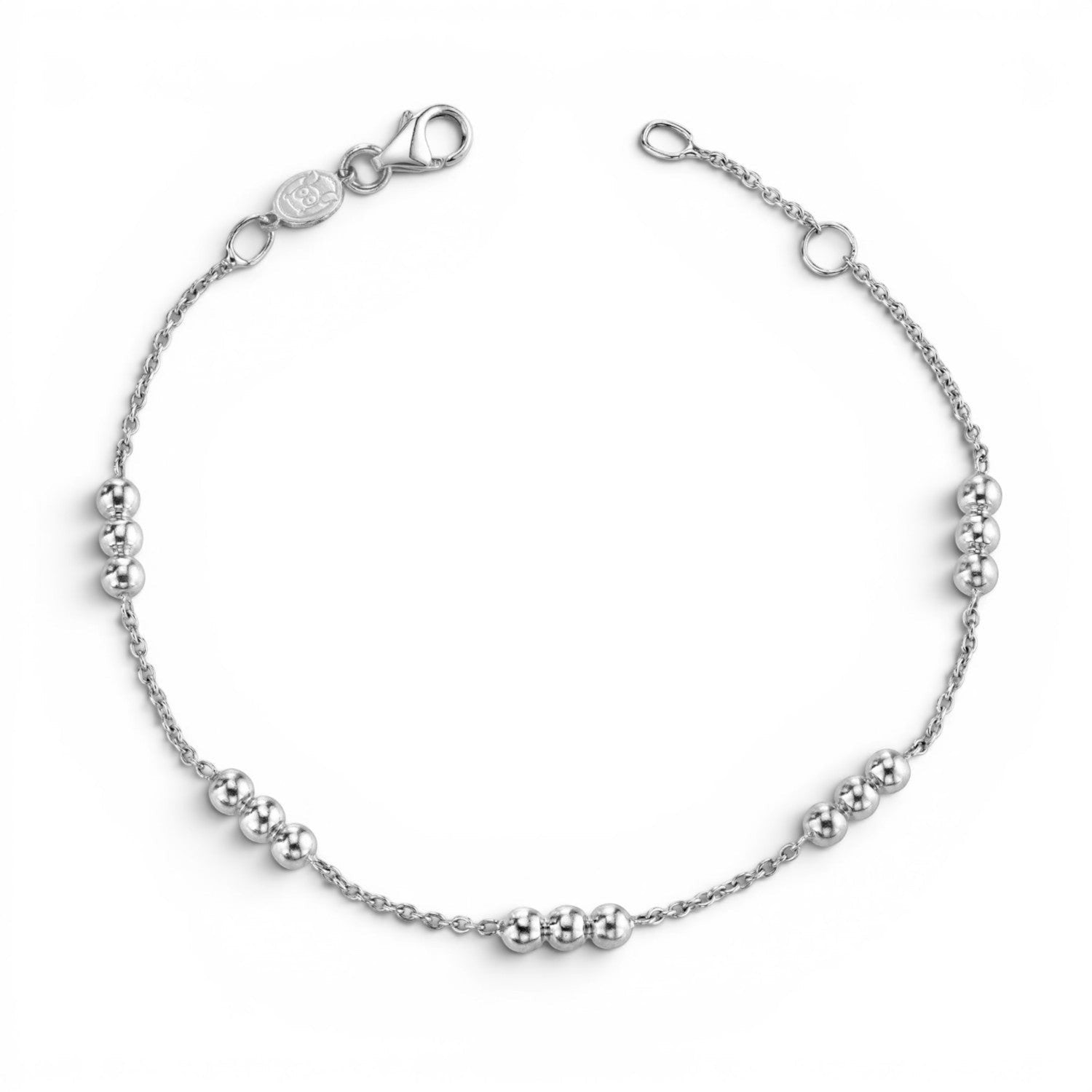 Lotus Diamond Kids Dainty Triple Gold Bead Bracelet, made with 100% recycled gold, featuring clusters of three beads spaced on a delicate chain.