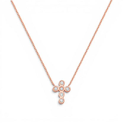 Lotus Diamond Kids 14K rose gold cross necklace with 5 bezel-set diamonds, approx. 0.10ct total.