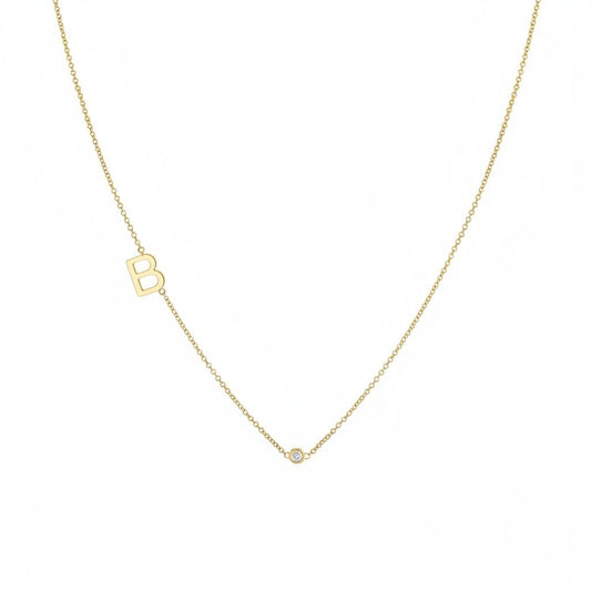 Lotus Diamond 14k yellow gold necklace with a single letter R charm and a bezel-set diamond.