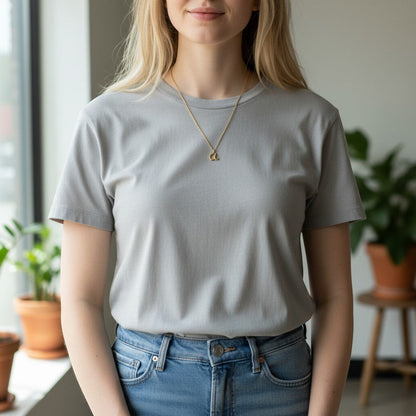 Lotus Diamond 14K yellow gold mini letter 'a' necklace on a delicate adjustable chain. Sustainable, handcrafted.