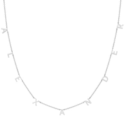 Lotus Diamond Kids Mini Spaced Letter Necklace in recycled gold, spelling "ALEXANDER".