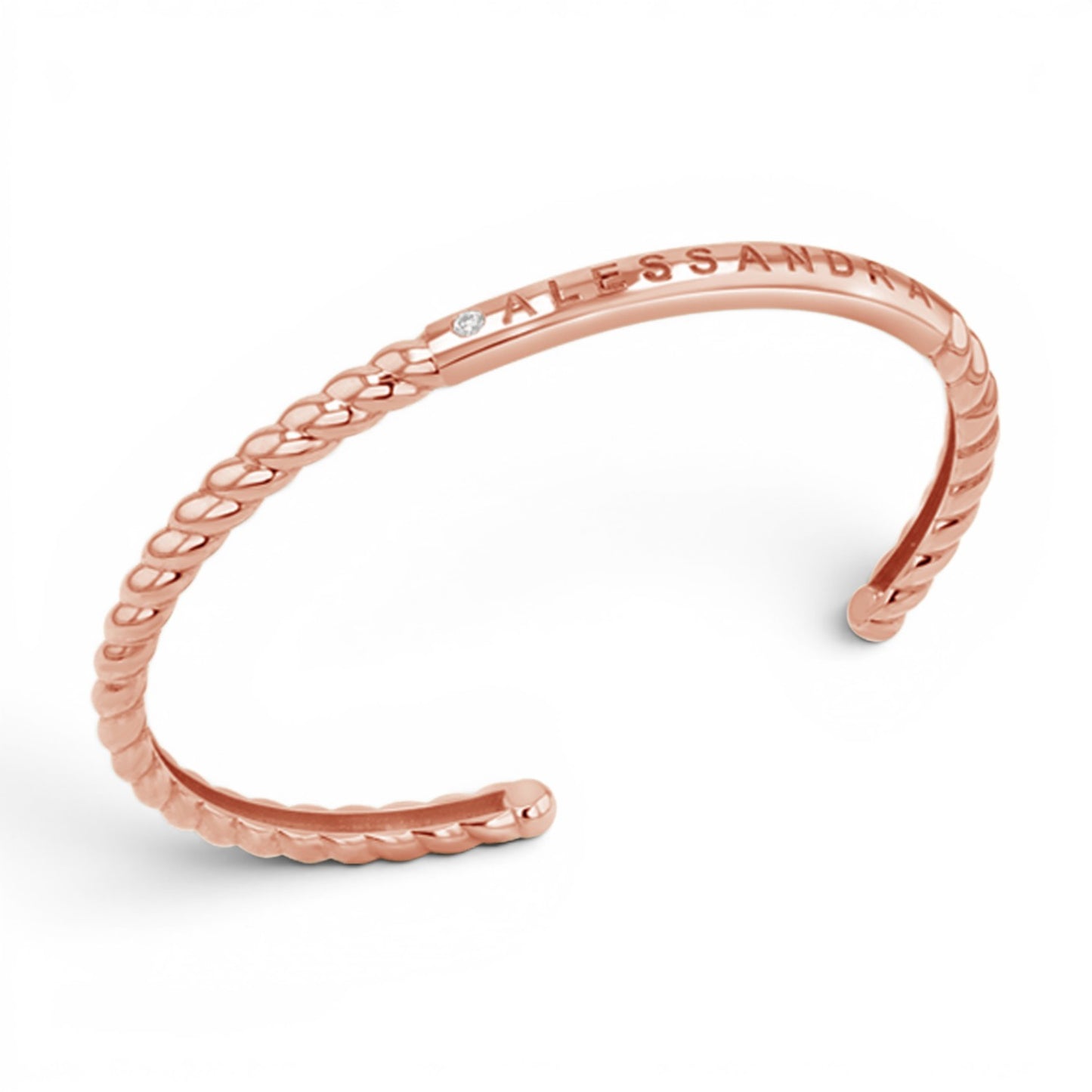 Lotus Diamond rose gold cuff bracelet with twisted detail and a single diamond accent. Engravable center.