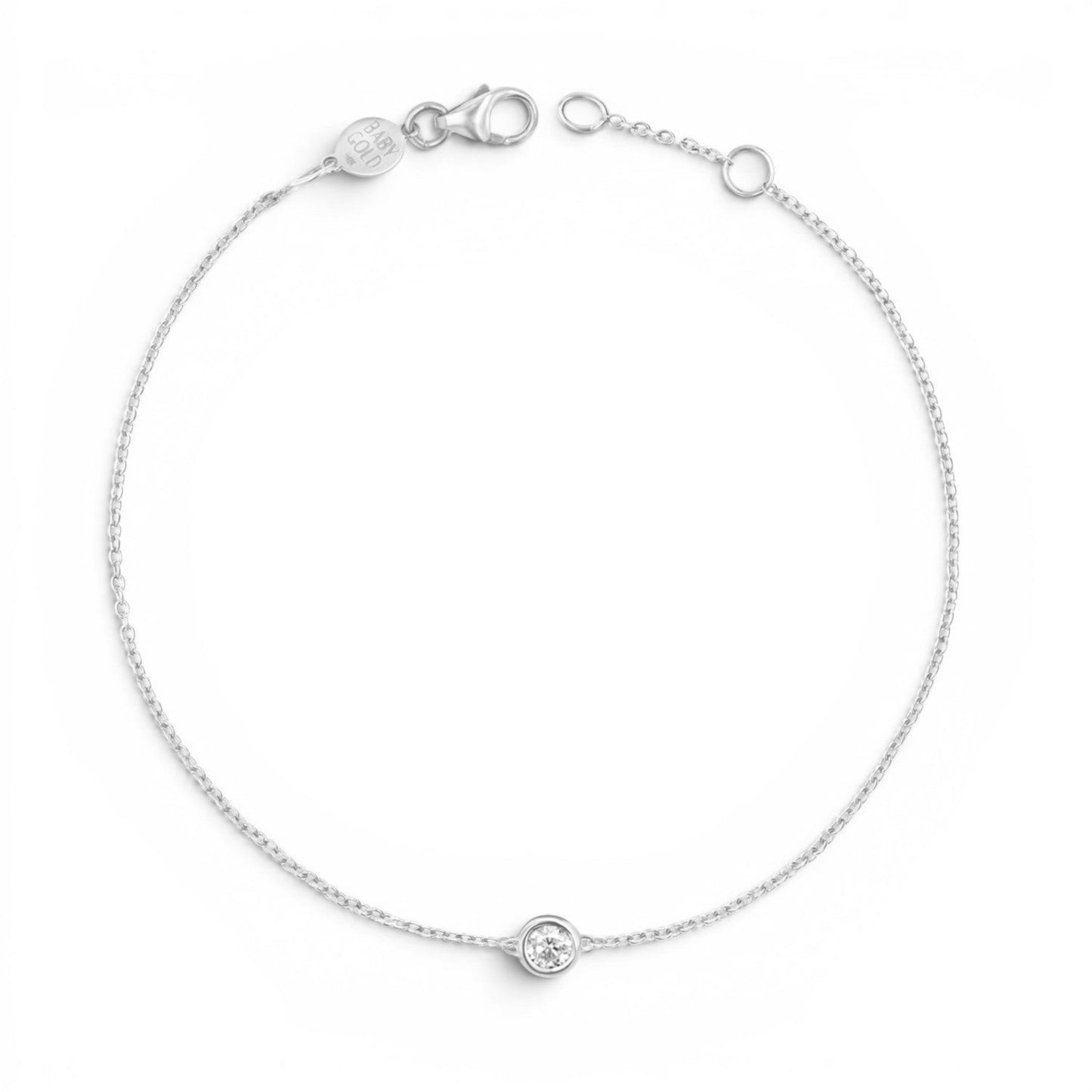 Lotus Diamond Kids Solitaire Diamond Bracelet, delicate 14K gold chain with a single round diamond in a bezel setting.