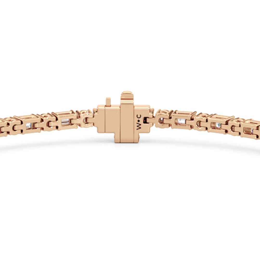 Oval with Trailing Round and Emeralds Tennis Bracelet - Lotus Diamond