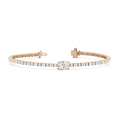 Oval with Trailing Round and Emeralds Tennis Bracelet - Lotus Diamond
