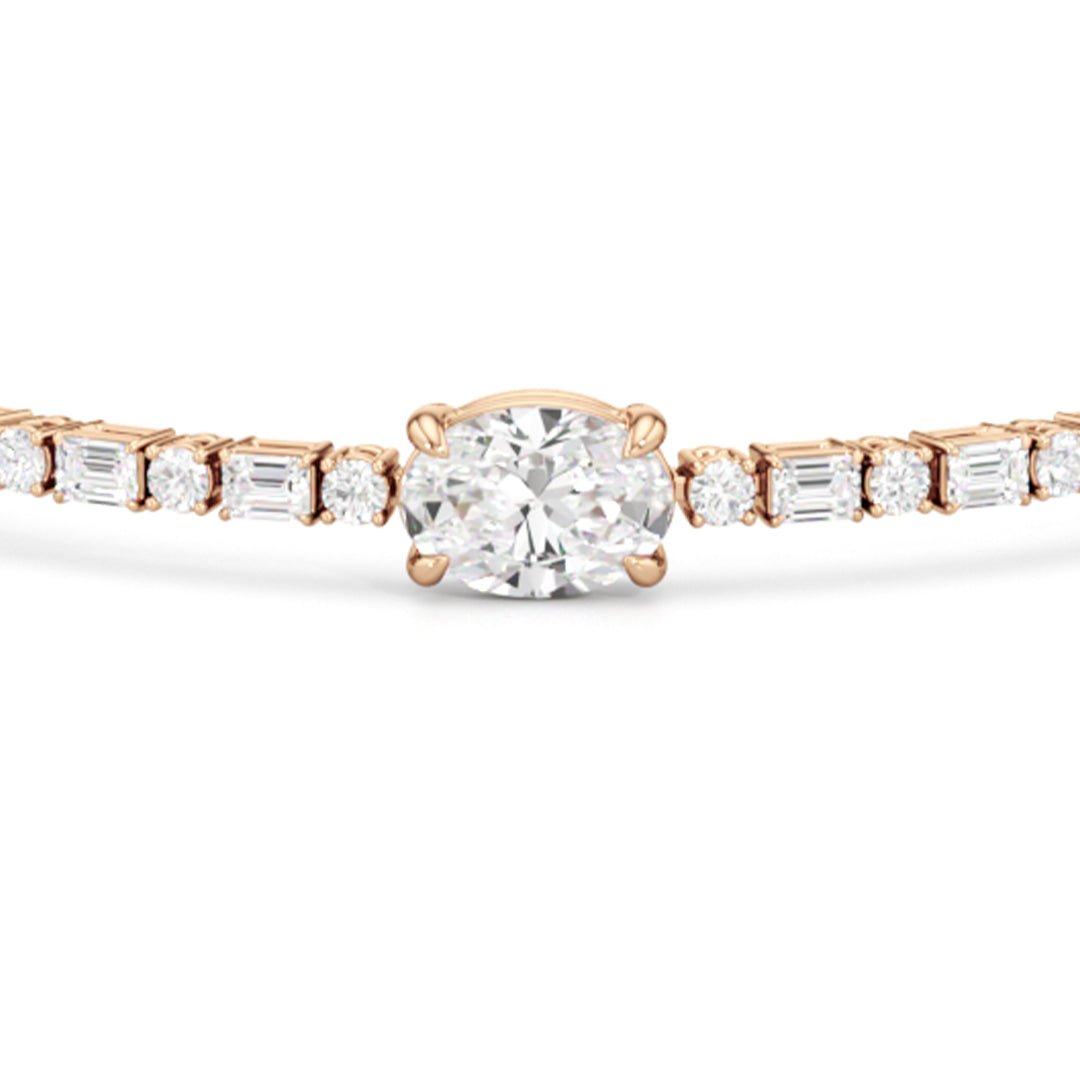 Oval with Trailing Round and Emeralds Tennis Bracelet - Lotus Diamond