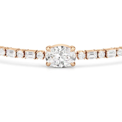 Oval with Trailing Round and Emeralds Tennis Bracelet - Lotus Diamond