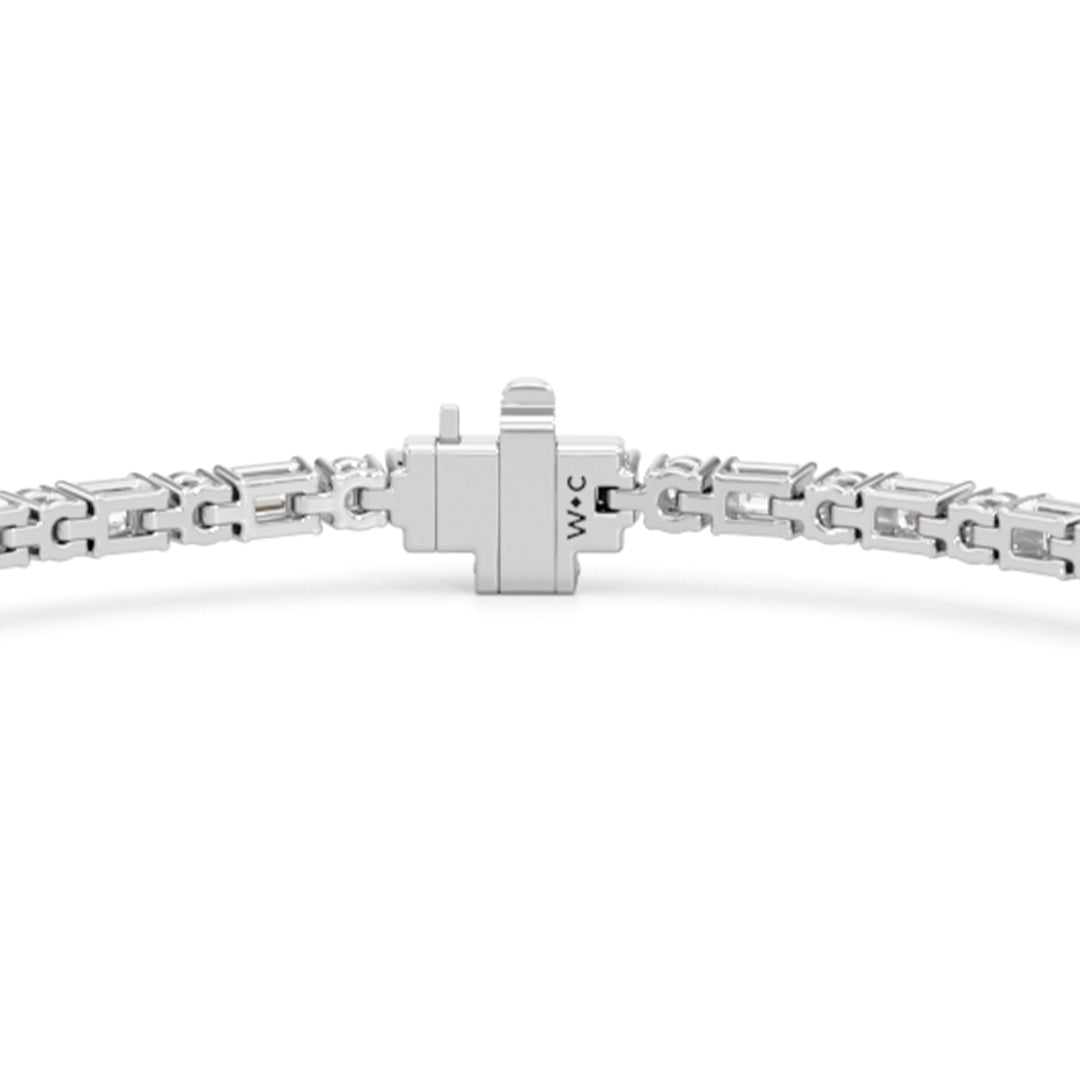 Oval with Trailing Round and Emeralds Tennis Bracelet - Lotus Diamond