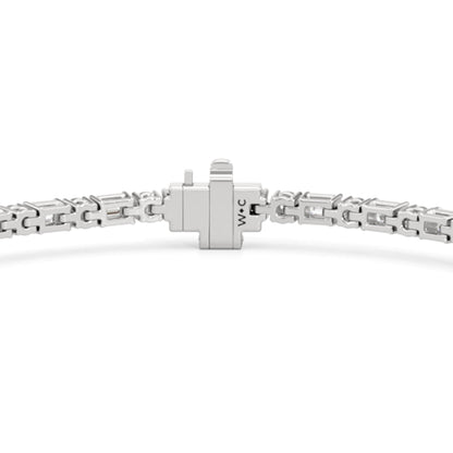 Oval with Trailing Round and Emeralds Tennis Bracelet - Lotus Diamond