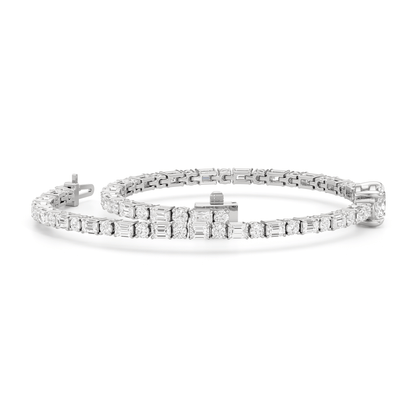 Oval with Trailing Round and Emeralds Tennis Bracelet - Lotus Diamond