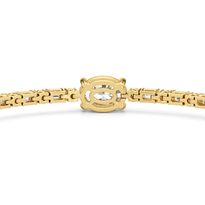 Oval with Trailing Round and Emeralds Tennis Bracelet - Lotus Diamond