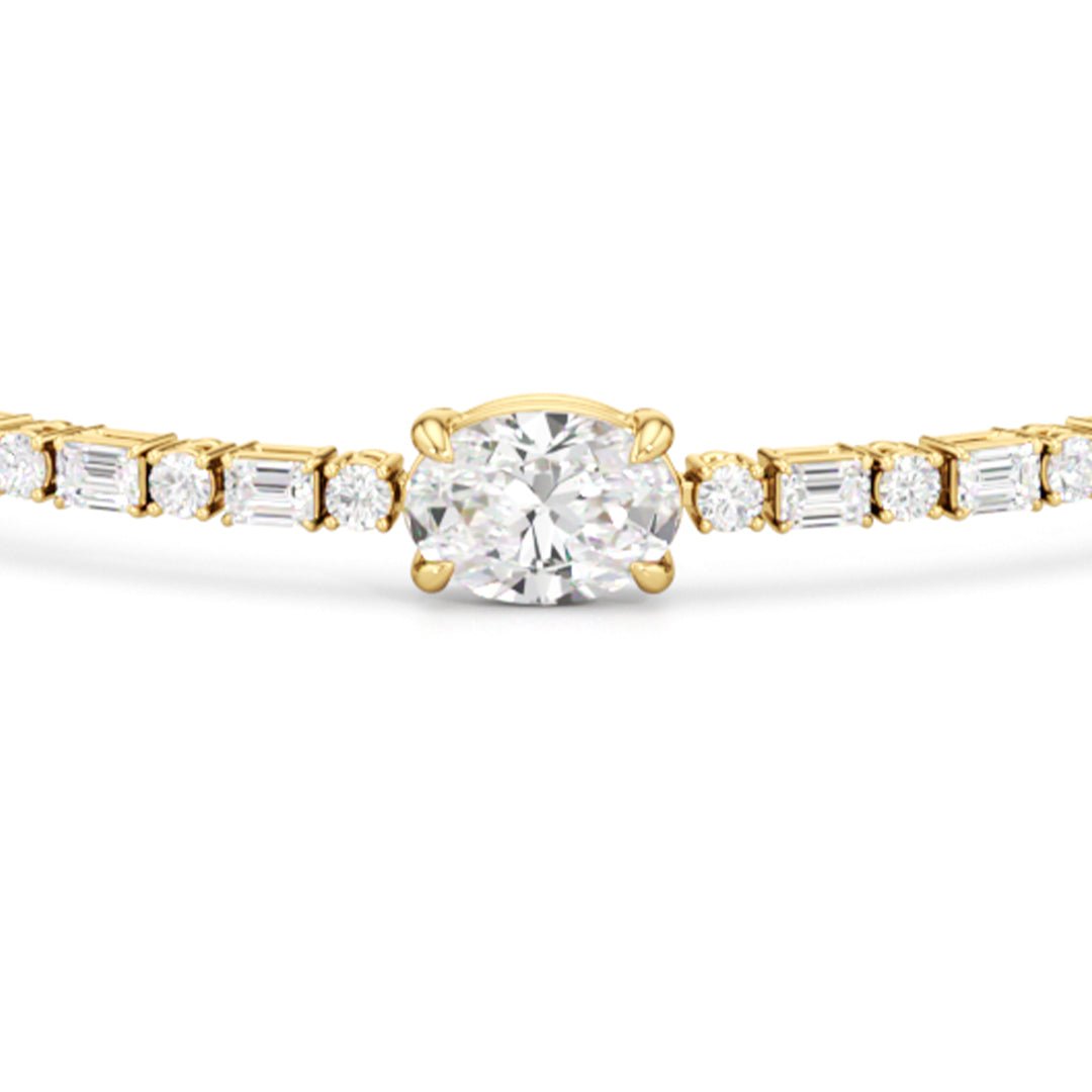 Oval with Trailing Round and Emeralds Tennis Bracelet - Lotus Diamond