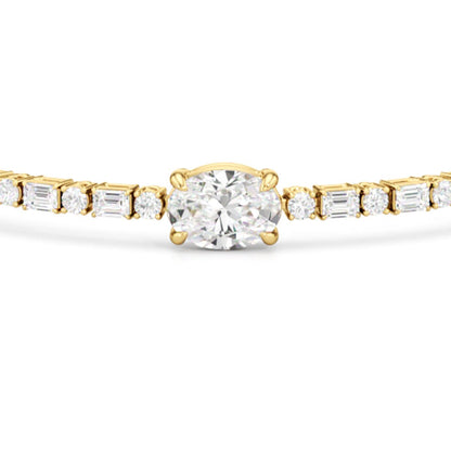 Oval with Trailing Round and Emeralds Tennis Bracelet - Lotus Diamond