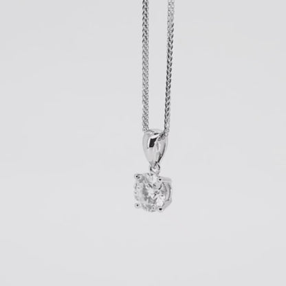 Classic four-jaw 18K diamond Pendant