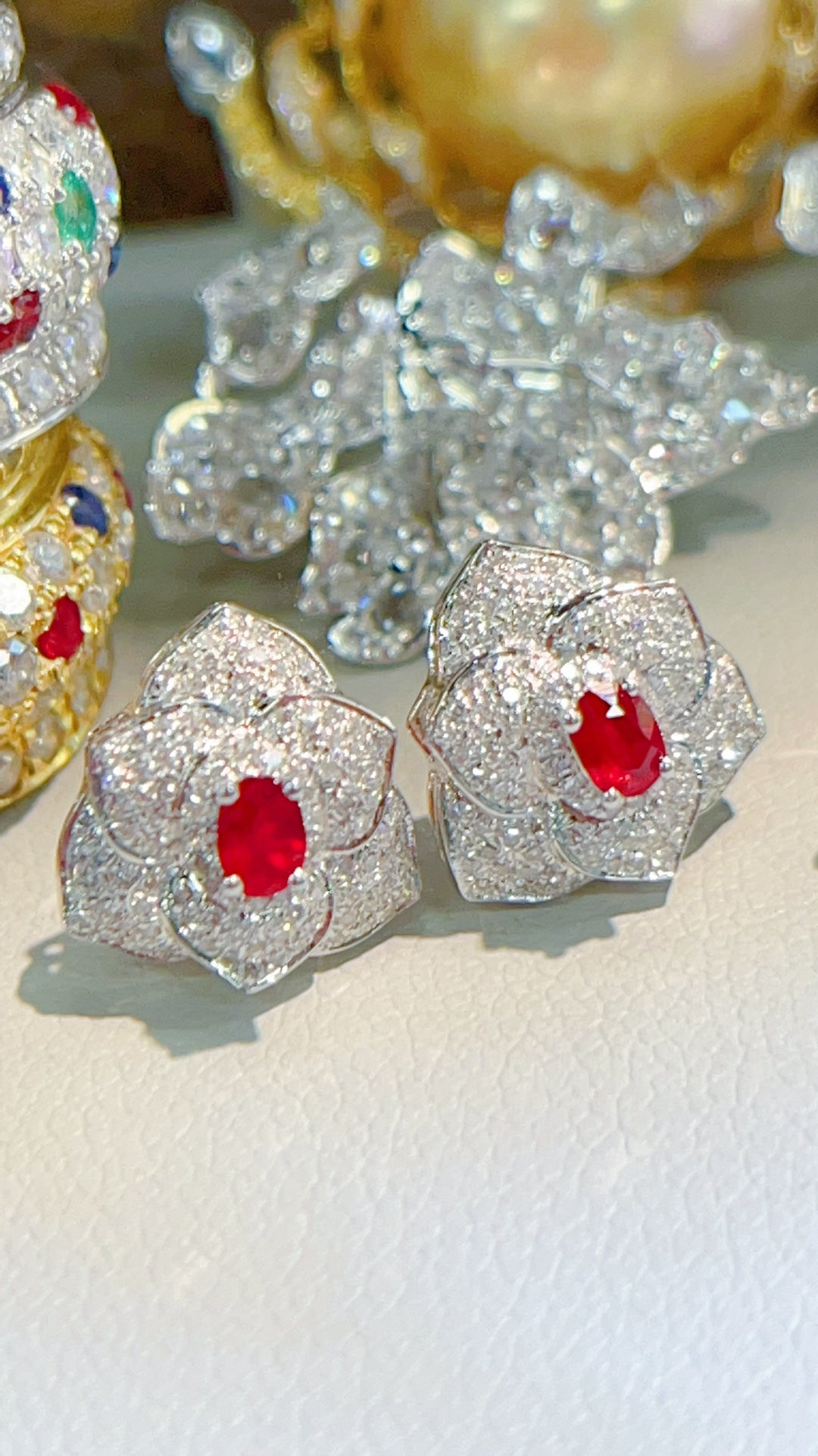 Diamond studded ruby stud earrings